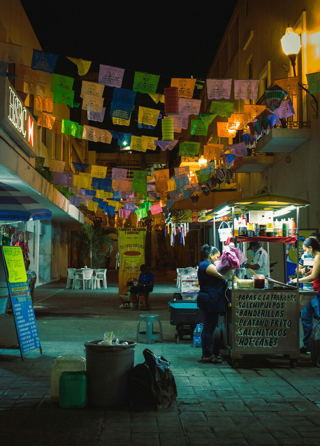 Group of Mexican people discussing ideas around a table with sticky notes